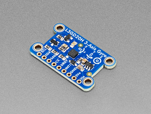 Angled shot of blue, rectangle-shaped gyroscope breakout board with four mounting holes.