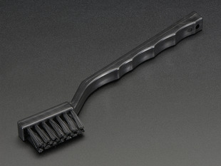 Black toothbrush-looking brush