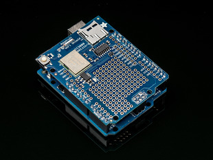Angled shot of a Adafruit HUZZAH CC3000 WiFi Shield with Onboard Antenna. 