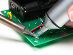 Solder sucker and iron working together