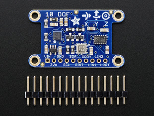 Top view of a Adafruit 10-DOF IMU Breakout board above a 16-pin header. 