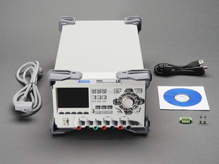 Front view shot of a Triple Output 195 Watt Power Supply and component that are included in package. 