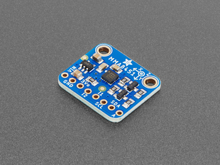 Angled shot of blue, square-shaped accelerometer breakout.