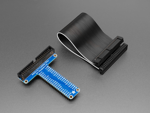 Angled shot of Assembled Pi T-Cobbler Plus next to GPIO ribbon cable