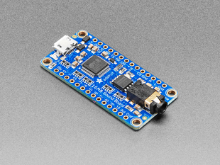 Angled shot of long blue rectangular audio FX sound board.