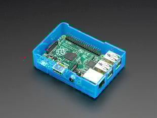 Angled shot of blue assembled Pi Model B+ / Pi 2 / Pi 3 case with the lid removed to show a Pi computer.