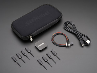 Angled shot of a Saleae Logic 4 - 4 Channels Logic / 1 Channel Analog and black zipper case. 