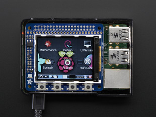 Top down view of a Adafruit PiTFT 2.2" HAT Mini Kit with desktop image on the display. 