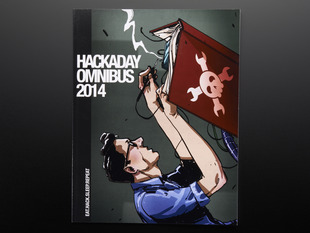 Front cover of "Hackaday Omnibus - Vol. 01 - 2014". Side profile of a dark-haired white man with glasses with a book and soldering iron.