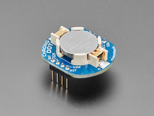 Angled shot of a ChronoDot - Ultra-precise Real Time Clock with a cell battery inserted. 
