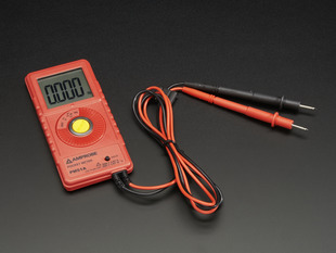 Angled shot of a PM51A - Amprobe Pocket Autoranging Digital Multimeter. 