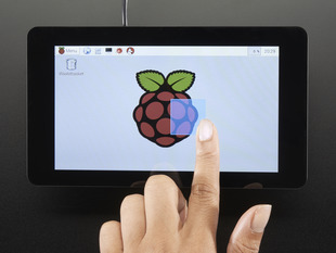 Top down view of a finger touching the screen of a Pi Foundation Display - 7" Touchscreen Display for Raspberry Pi. 