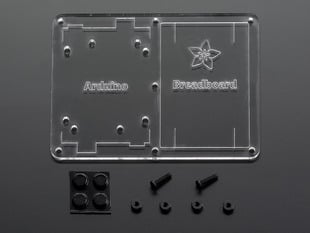 Top down view of a Plastic mounting plate for breadboard and Arduino with rubber bummper and mounting screws. 