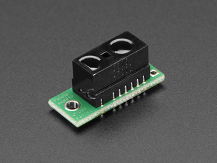 Angled shot of a Sharp GP2Y0D805Z0F Digital Distance Sensor with Pololu Carrier. 