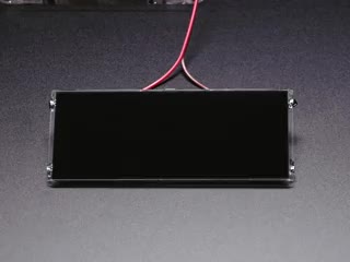 Large Liquid Crystal Light Valve - Controllable Shutter Glass turning on and off, showing and hiding a robot pin.