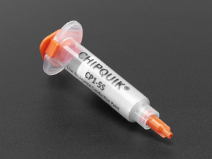 Syringe with silvery paste inside
