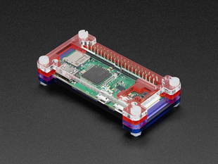 Angled shot of an assembled Pibow Zero W Case on a Raspberry Pi Zero. 