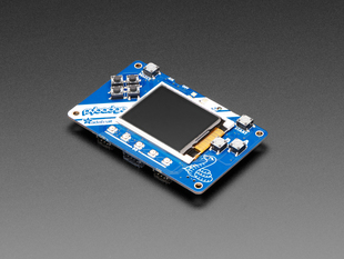 Angled shot of a Adafruit PyBadge for MakeCode Arcade, CircuitPython, or Arduino. 