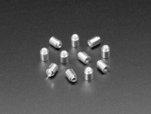 Angled shot of ten 6mm tall M3 standoff nuts.