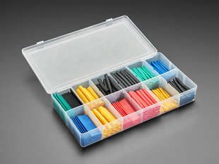 Opened box full of short lengths of multi color heat shrink