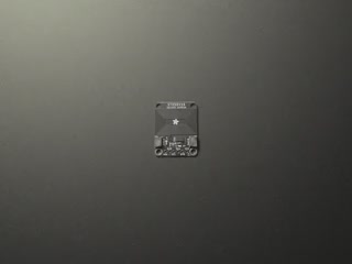 Hand brings phone close to breakout board, and shows phone recognizing an RFID tag