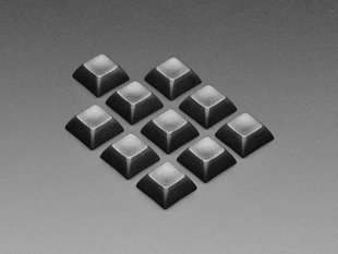 Angled shot of 10 black keycaps.