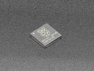 Angled shot of single RP2040 microchip.