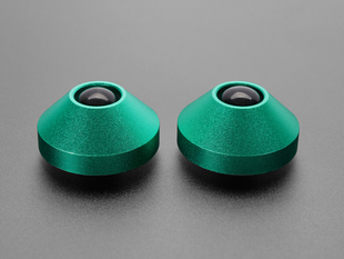 Angled shot of two green aluminum bumper feet.