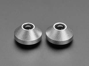 Angled shot of two silver aluminum bumper feet.
