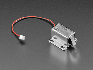 Angled shot of short lock-style solenoid with 2-pin JST connector.