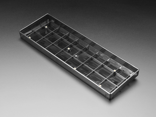 Angled shot of a Translucent Smoke Plastic 65% / JKDK K68 Keyboard Shell. 