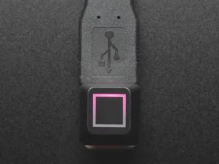 Close-up video of Zener ESP Square keycap glowing rainbow colors.