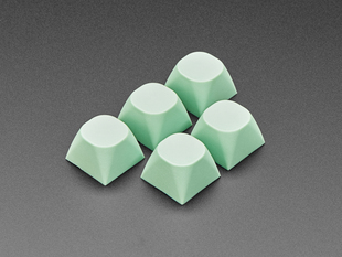 Angled shot of 10 mint screen MA keycaps.