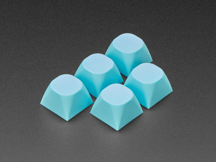 Angled shot of five cyan keycaps.