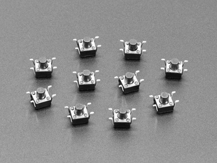 Angled shot of ten reverse tactile button switches.