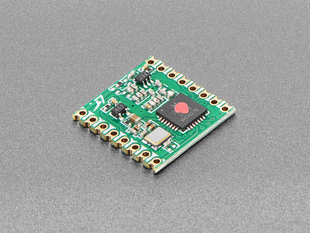 Angled shot of green LoRa radio module.