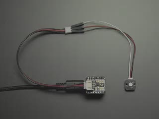 Video of an LED breakout emitting rainbow colors.