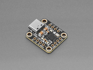 Angled shot of black, square-shaped USB breakout board.