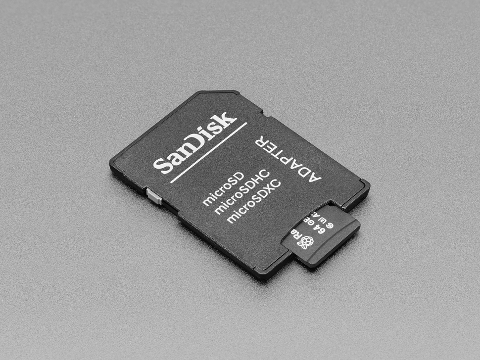 Angled shot of black SD card with a microSD card popping out.