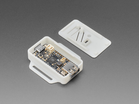 Angled shot of half-assembled enclosure with microcontroller.